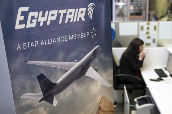 2016-05-19 12:11:03 epa05316517 A hostess talks on the phone next to the Egyptair's desk at the Charles de Gaule airport near Paris, France, 19 May 2016. According to media reports quoting Egyptair on 19 May 2016, EgyptAir Airbus A320 Flight MS804 disappeared off radar some 10 miles (16km) after entering Egypt's airspace. The plane, said to be carrying 69 people on board, 59 passengers and 10 crew members, took off from France's Charles de Gaulle airport on 18 May night and was expected to land in Cairo on 19 May early morning. EPA/ETIENNE LAURENT