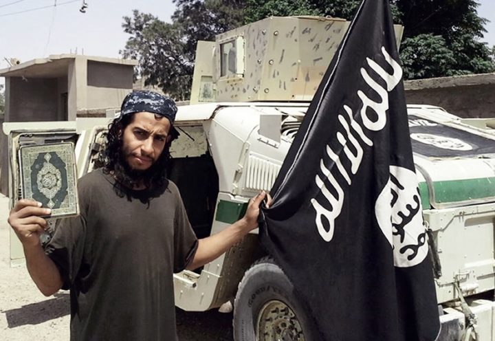 2015-11-16 13:19:21 An undated picture taken on November 16, 2015 from the February 2015 issue 7 of the Islamic State (IS) group online English-language magazine Dabiq, purportedly shows 27-year-old Belgian IS group leading militant Abdelhamid Abaaoud, also known as Abu Umar al-Baljiki and believed to be the mastermind of a jihadist cell dismantled in Belgium in January 2015, posing at an undisclosed location to illustrate an interview he gave to the magazine. The body of the suspected mastermind of the Paris attacks, Abdelhamid Abaaoud, has been identified among those killed in a police raid, the prosecutor's office said on November 19, 2015. AFP PHOTO / HO / DABIQ === RESTRICTED TO EDITORIAL USE - MANDATORY CREDIT "AFP PHOTO / HO / DABIQ" - NO MARKETING NO ADVERTISING CAMPAIGNS - DISTRIBUTED AS A SERVICE TO CLIENTS FROM ALTERNATIVE SOURCES, AFP IS NOT RESPONSIBLE FOR ANY DIGITAL ALTERATIONS TO THE PICTURE'S EDITORIAL CONTENT, DATE AND LOCATION WHICH CANNOT BE INDEPENDENTLY VERIFIED ===
