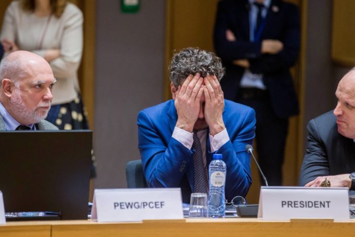 2017-03-20 16:19:28 epa05860215 President of Eurogroup, Dutch Finance Minister, Jeroen Dijsselbloem (C) covers his face prior to the start of a Eurogroup Finance Ministers' meeting at the European Council headquarters in Brussels, Belgium, 20 March 2017. EPA/STEPHANIE LECOCQ