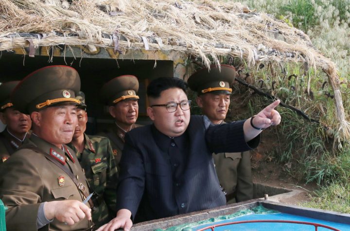 2017-05-05 20:43:46 This undated picture released from North Korea's official Korean Central News Agency (KCNA) on May 5, 2017 shows North Korean leader Kim Jong-Un (C) inspecting the defence detachment on Jangjae Islet and the Hero Defence Detachment on Mu Islet located in the southernmost part of the waters off the southwest front. / AFP PHOTO / KCNA VIA KNS / STR / South Korea OUT / REPUBLIC OF KOREA OUT ---EDITORS NOTE--- RESTRICTED TO EDITORIAL USE - MANDATORY CREDIT "AFP PHOTO/KCNA VIA KNS" - NO MARKETING NO ADVERTISING CAMPAIGNS - DISTRIBUTED AS A SERVICE TO CLIENTS THIS PICTURE WAS MADE AVAILABLE BY A THIRD PARTY. AFP CAN NOT INDEPENDENTLY VERIFY THE AUTHENTICITY, LOCATION, DATE AND CONTENT OF THIS IMAGE. THIS PHOTO IS DISTRIBUTED EXACTLY AS RECEIVED BY AFP. /